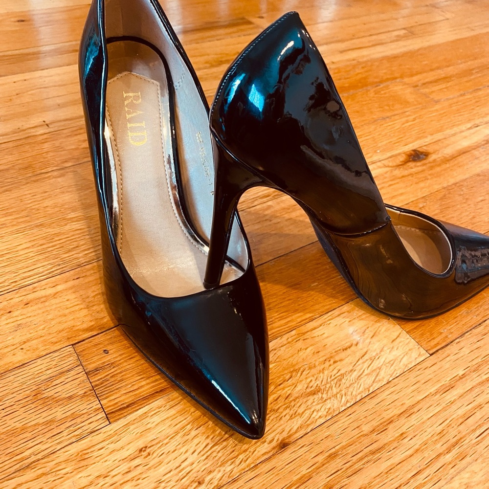 RAID black patent leather 4 inch heels.